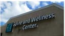 The Spine and Wellness Center logo