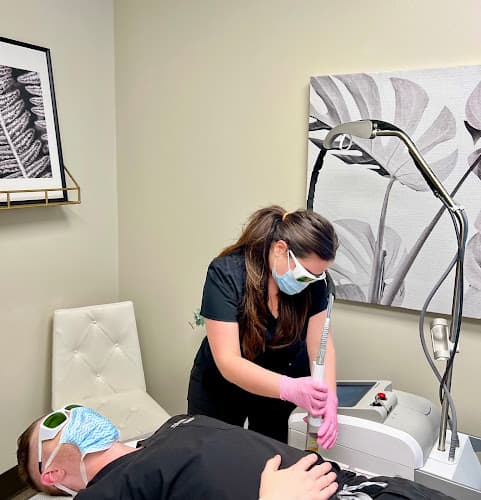 Skin by Design Spa & Laser Center logo
