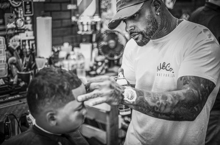Whiskers Barber Company & Shave Parlor (Exeter) Logo