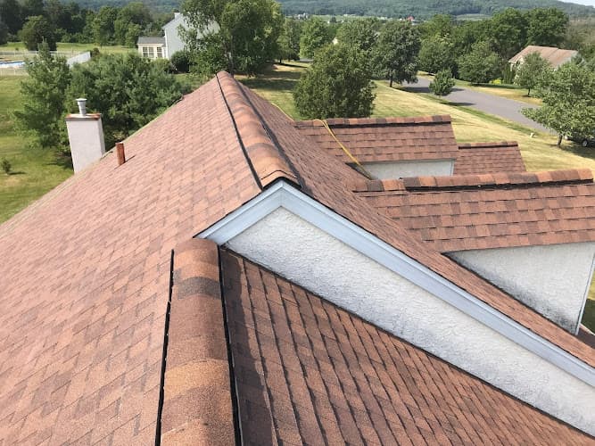 Mast Roofing & Construction Logo