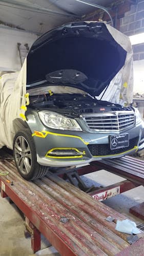 Conrad's Body Shop logo