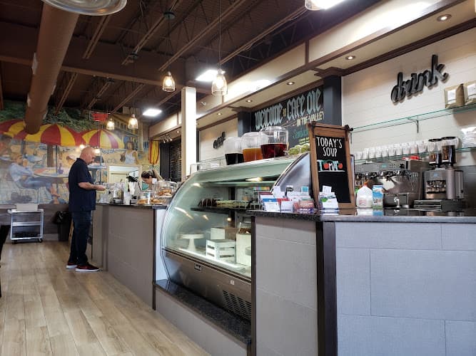 Cafe Ole in The Valley logo
