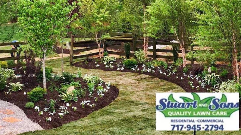 Stuart and Sons Quality Lawn Care logo