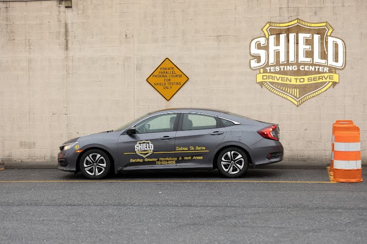 Shield Driving School logo