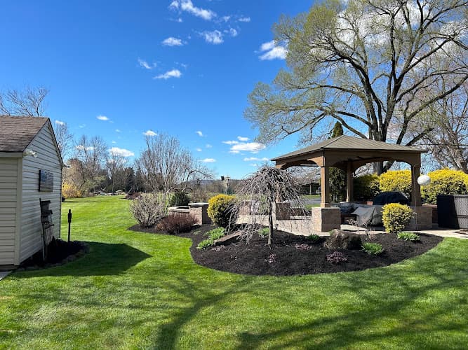 Iconic Cleanup Landscaping Logo